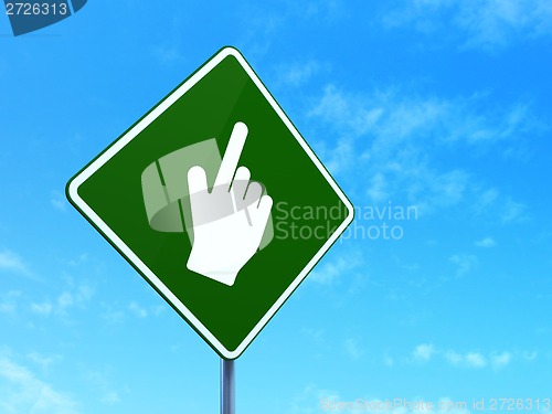 Image of Web development concept: Mouse Cursor on road sign background