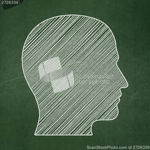 Image of Education concept: Head on chalkboard background
