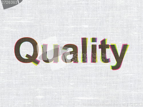 Image of Advertising concept: Quality on fabric texture background