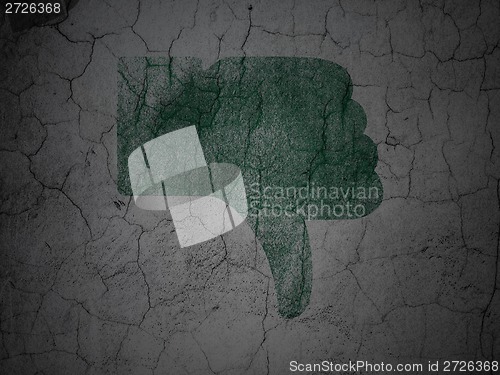 Image of Social media concept: Thumb Down on grunge wall background