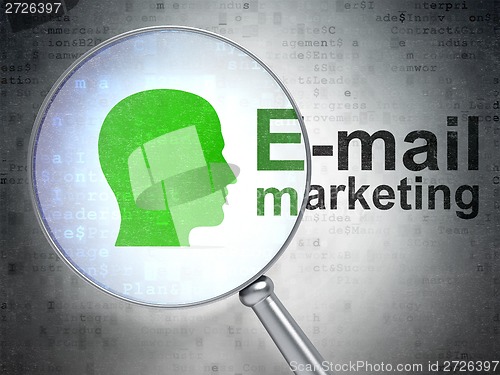 Image of Advertising concept: Head and E-mail Marketing with optical glass