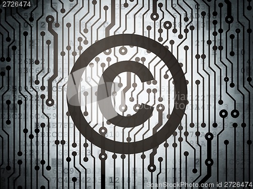 Image of Law concept: circuit board with Copyright