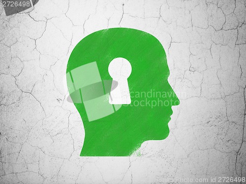 Image of Finance concept: Head With Keyhole on wall background
