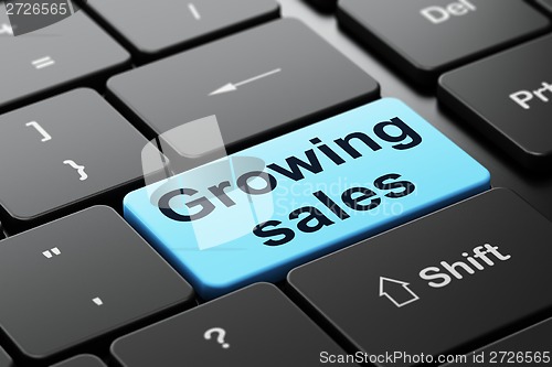 Image of Business concept: Growing Sales on computer keyboard background