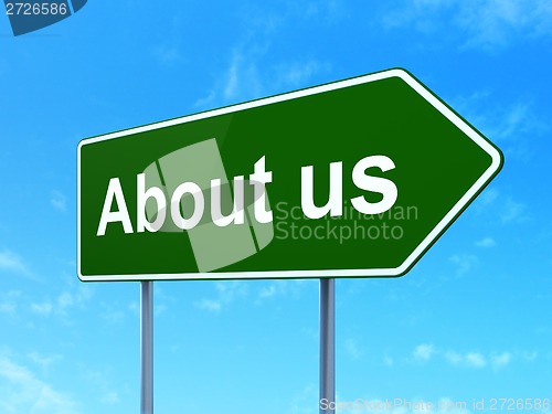 Image of Advertising concept: About Us on road sign background