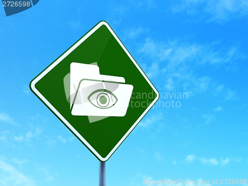Image of Finance concept: Folder With Eye on road sign background