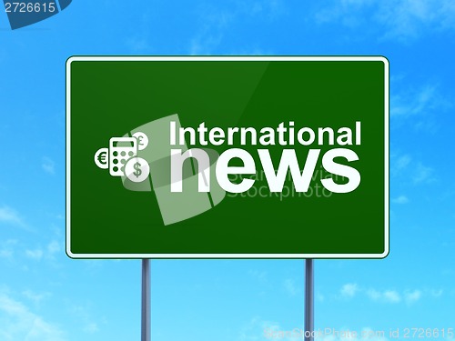 Image of International News and Calculator on road sign background