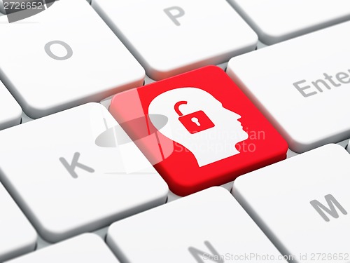 Image of Finance concept: Head With Padlock on computer keyboard background