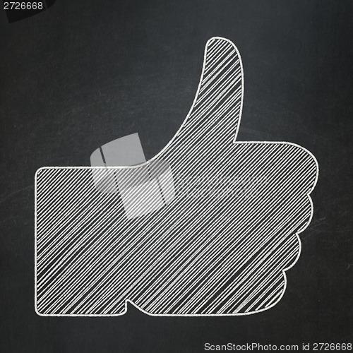 Image of Social media concept: Thumb Up on chalkboard background