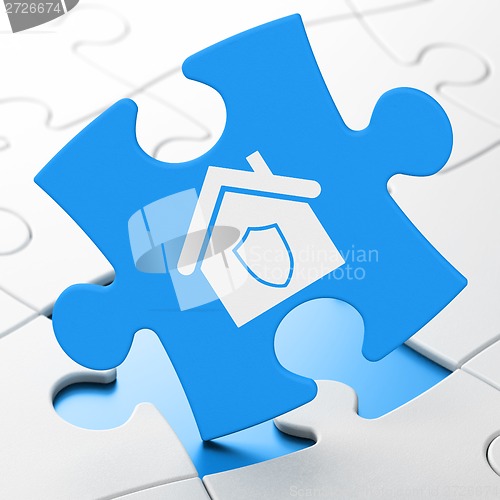 Image of Security concept: Home on puzzle background
