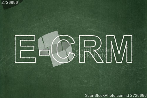 Image of Finance concept: E-CRM on chalkboard background