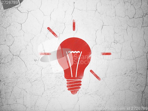 Image of Business concept: Light Bulb on wall background