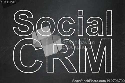 Image of Business concept: Social CRM on chalkboard background
