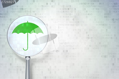 Image of Safety concept:  Umbrella with optical glass on digital background