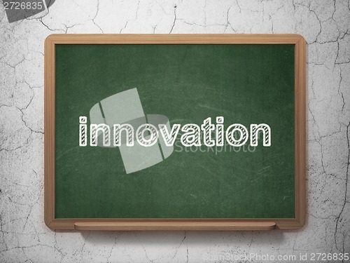 Image of Finance concept: Innovation on chalkboard background