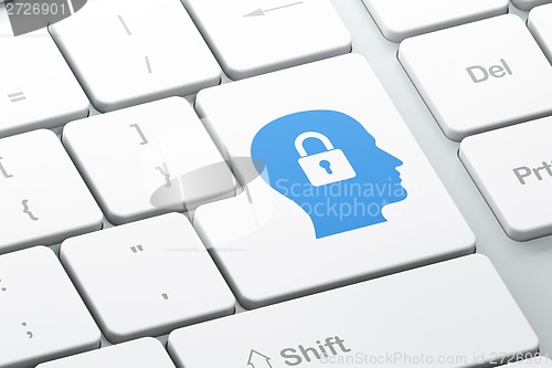 Image of Data concept: Head With Padlock on computer keyboard background