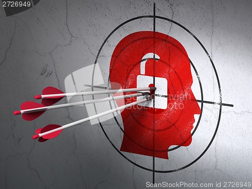 Image of Business concept: arrows in Head With Padlock target on wall background