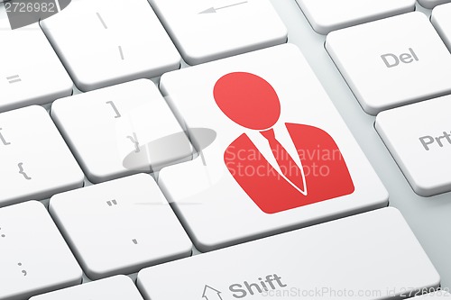 Image of Finance concept: Business Man on computer keyboard background