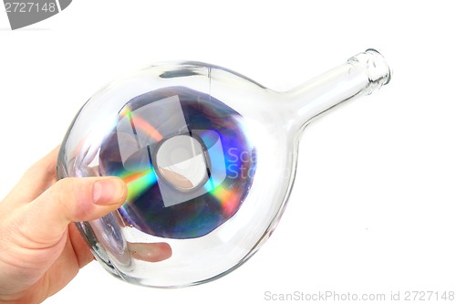 Image of CD or DVD in the glass bottle 