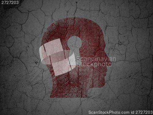 Image of Information concept: Head With Keyhole on grunge wall background