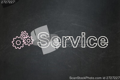 Image of Business concept: Gears and Service on chalkboard background
