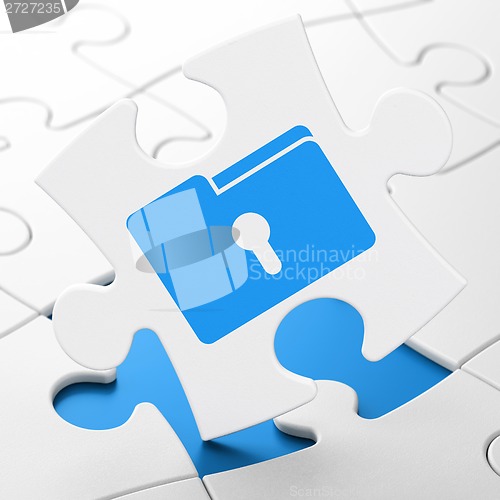 Image of Finance concept: Folder With Keyhole on puzzle background