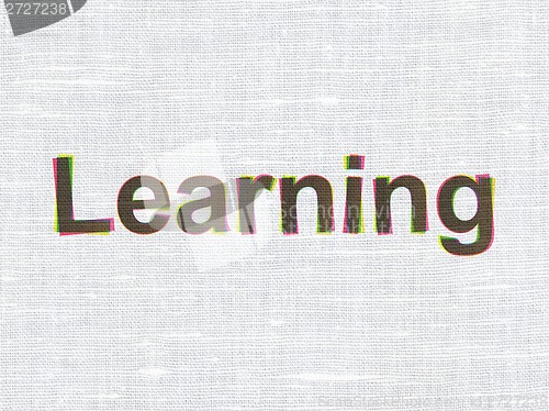 Image of Education concept: Learning on fabric texture background