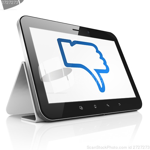 Image of Social network concept: Thumb Down on tablet pc computer