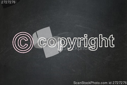 Image of Law concept: Copyright and Copyright on chalkboard background
