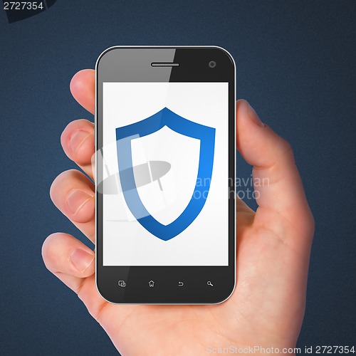 Image of Safety concept: Contoured Shield on smartphone