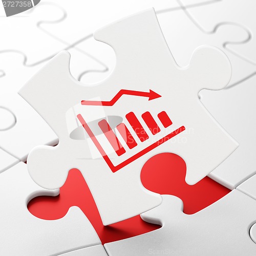 Image of Advertising concept: Decline Graph on puzzle background