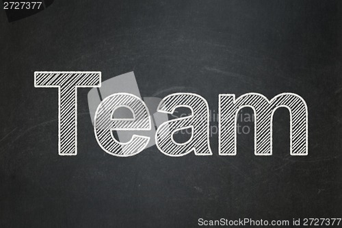 Image of Finance concept: Team on chalkboard background