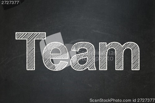 Image of Finance concept: Team on chalkboard background