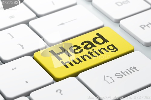 Image of Business concept: Head Hunting on computer keyboard background