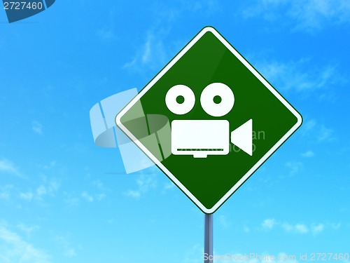 Image of Vacation concept: Camera on road sign background