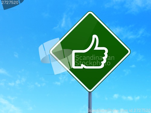 Image of Social media concept: Thumb Up on road sign background