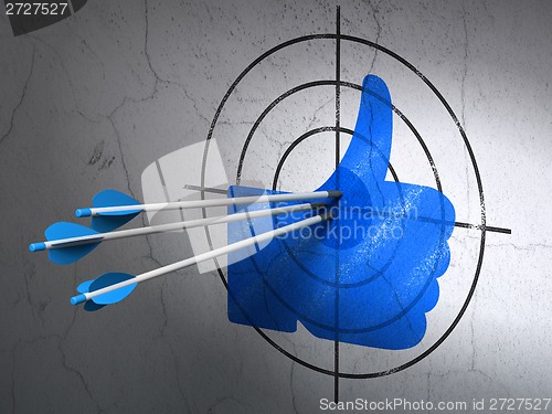 Image of Social network concept: arrows in Thumb Up target on wall background