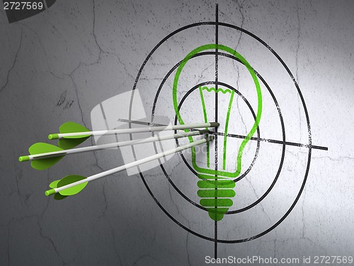 Image of Business concept: arrows in Light Bulb target on wall background