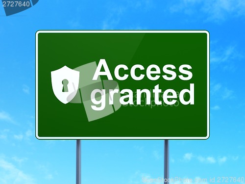 Image of Privacy concept: Access Granted and Shield Keyhole on road sign