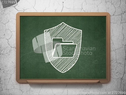 Image of Business concept: Folder With Shield on chalkboard background