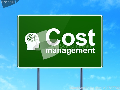 Image of Finance concept: Cost Management and Head With Finance Symbol on road sign background