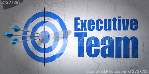 Image of Finance concept: target and Executive Team on wall background