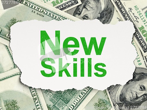Image of Education concept: New Skills on Money background