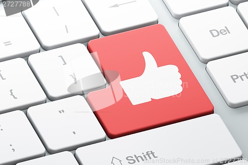 Image of Social network concept: Thumb Up on computer keyboard background