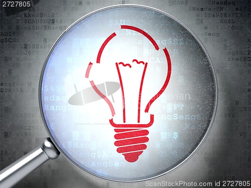Image of Finance concept: Light Bulb with optical glass on digital background