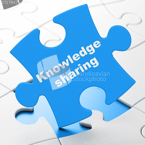 Image of Education concept: Knowledge Sharing on puzzle background