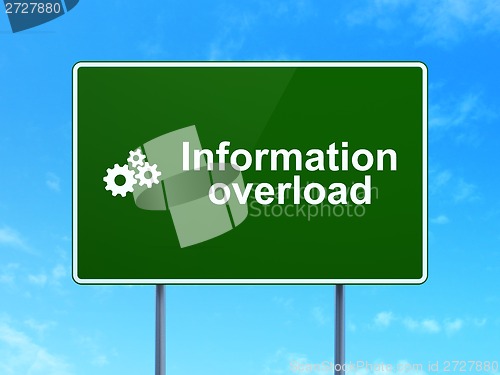 Image of Data concept: Information Overload and Gears on road sign background