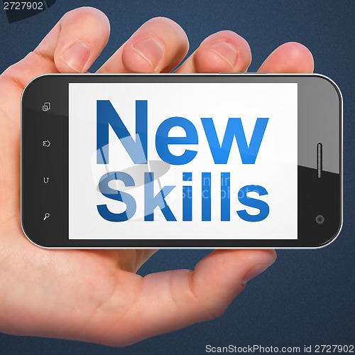 Image of Education concept: New Skills on smartphone