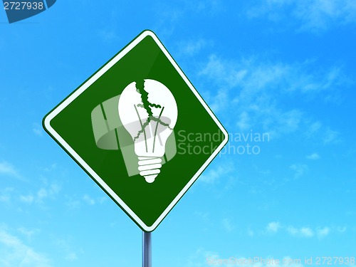 Image of Finance concept: Light Bulb on road sign background