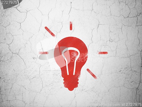 Image of Finance concept: Light Bulb on wall background